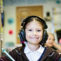 Happy girl in a classroom